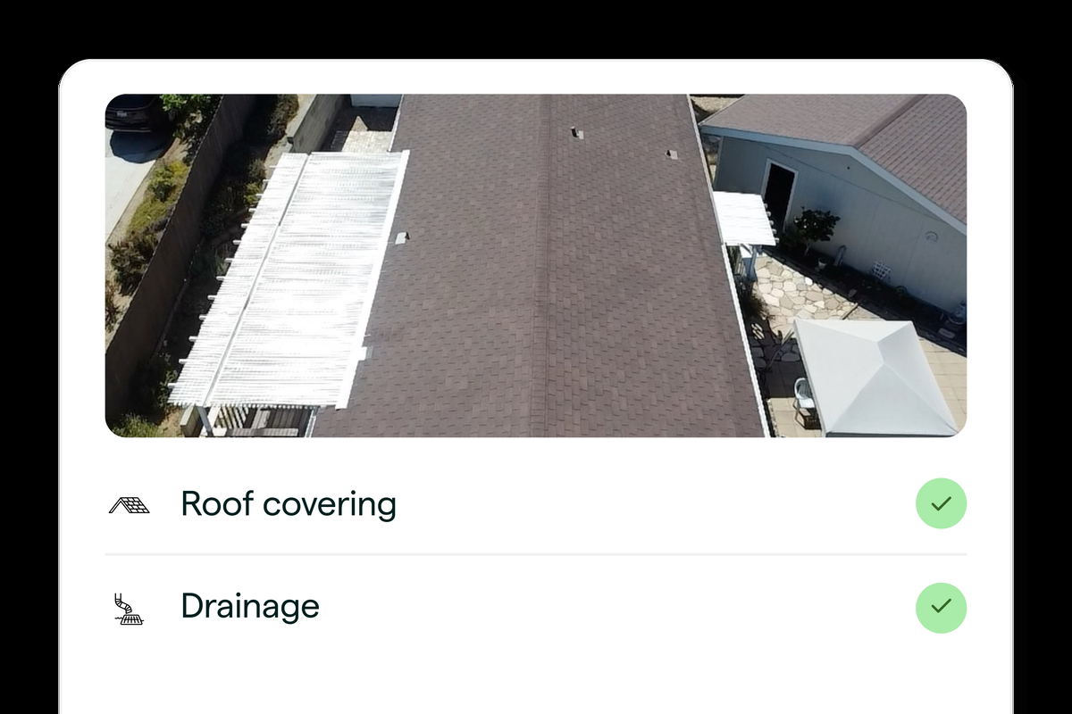 Roof inspection result showing roof covering and drainage checked on a tile roof