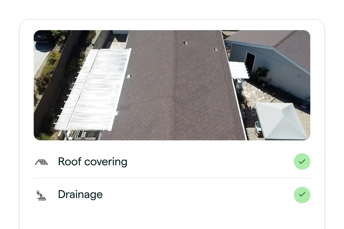 Roof inspection result showing roof covering and drainage checked on a tile roof
