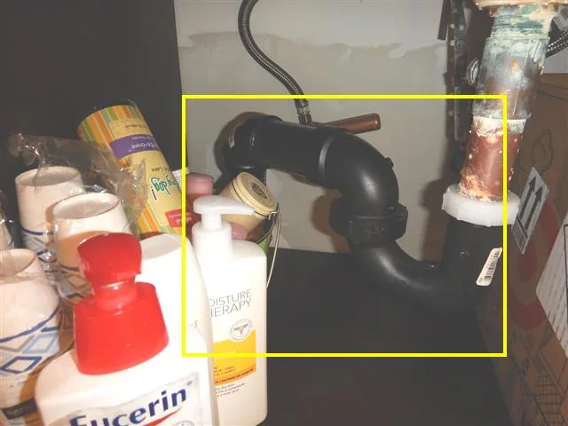 Waste line during a plumbing inspection