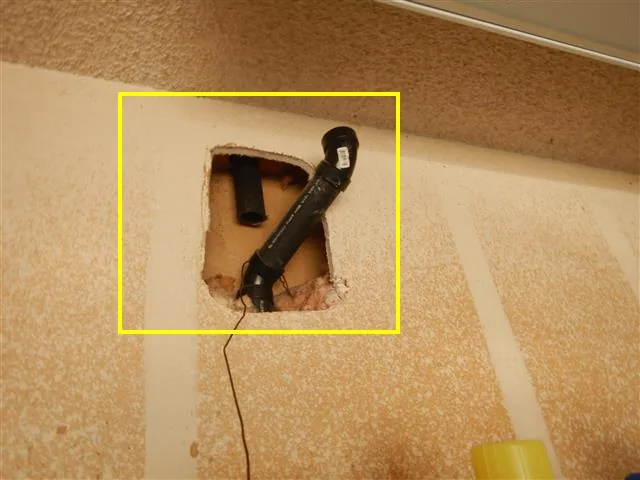 Drain piping checked during an inspection