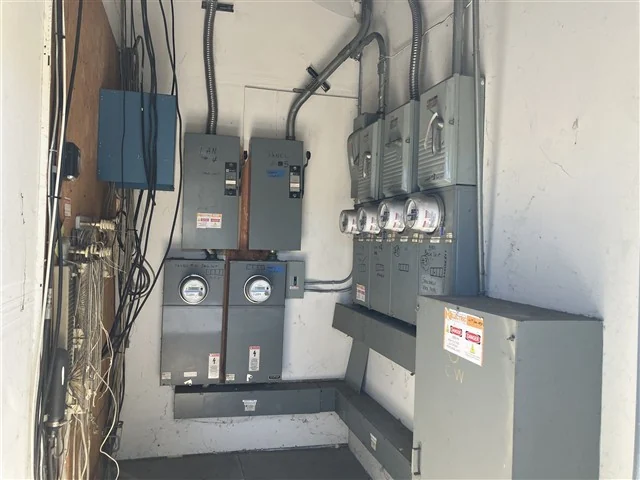 Meters, disconnects and conduit at the electrical service of a commercial building