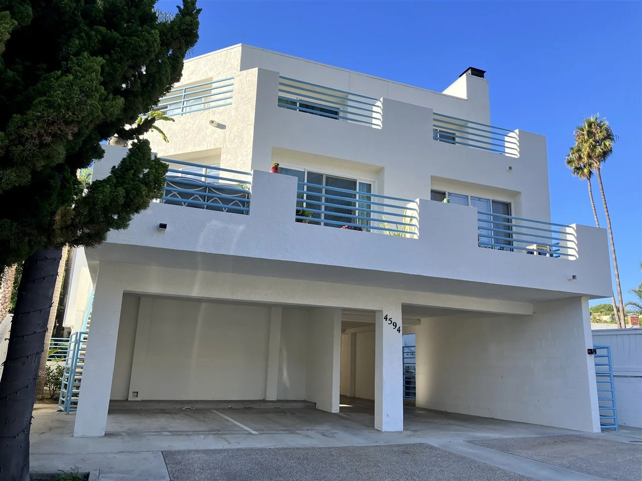 A modern multi-unit residential building in San Diego County, inspected for its owner