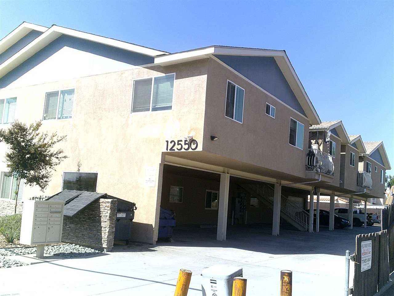 Apartment building at 12550 Laurel St Lakeside during a balcony and walkway inspection