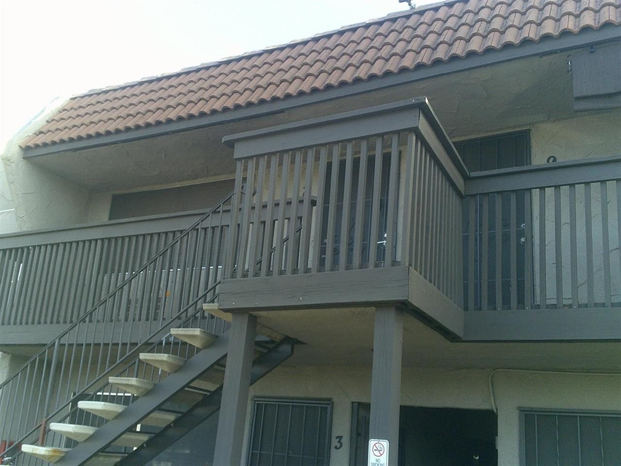 Apartment building at 12802 Mapleview St Lakeside during a balcony and walkway inspection