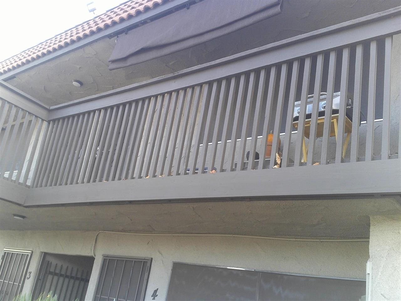 Apartment building at 12802 Mapleview St Lakeside during a balcony and walkway inspection