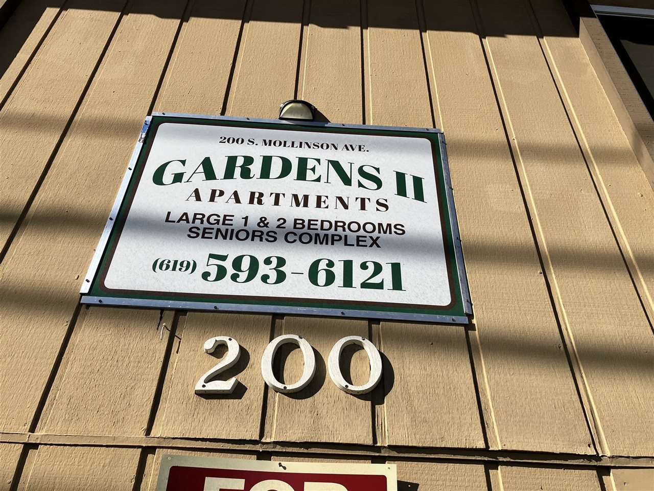 Apartment building at 200 S Mollison Ave Gardens Ii during a balcony and walkway inspection