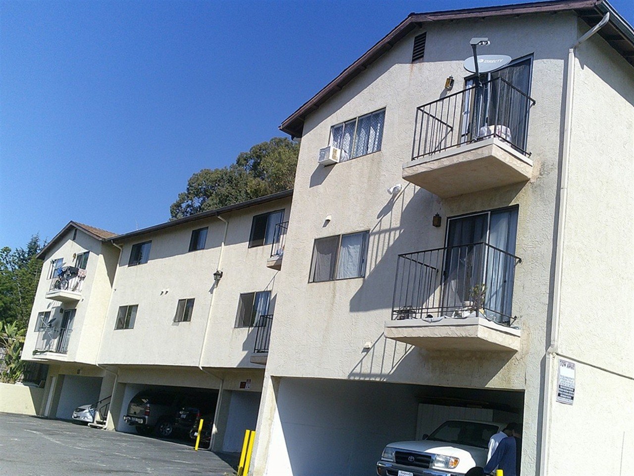 Apartment building at 2034 Canyon Dr during a balcony and walkway inspection