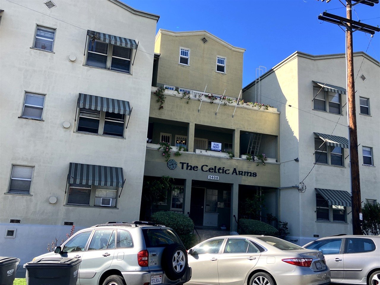 Apartment building at 2408 Second Ave The Celtic Arms during a balcony and walkway inspection