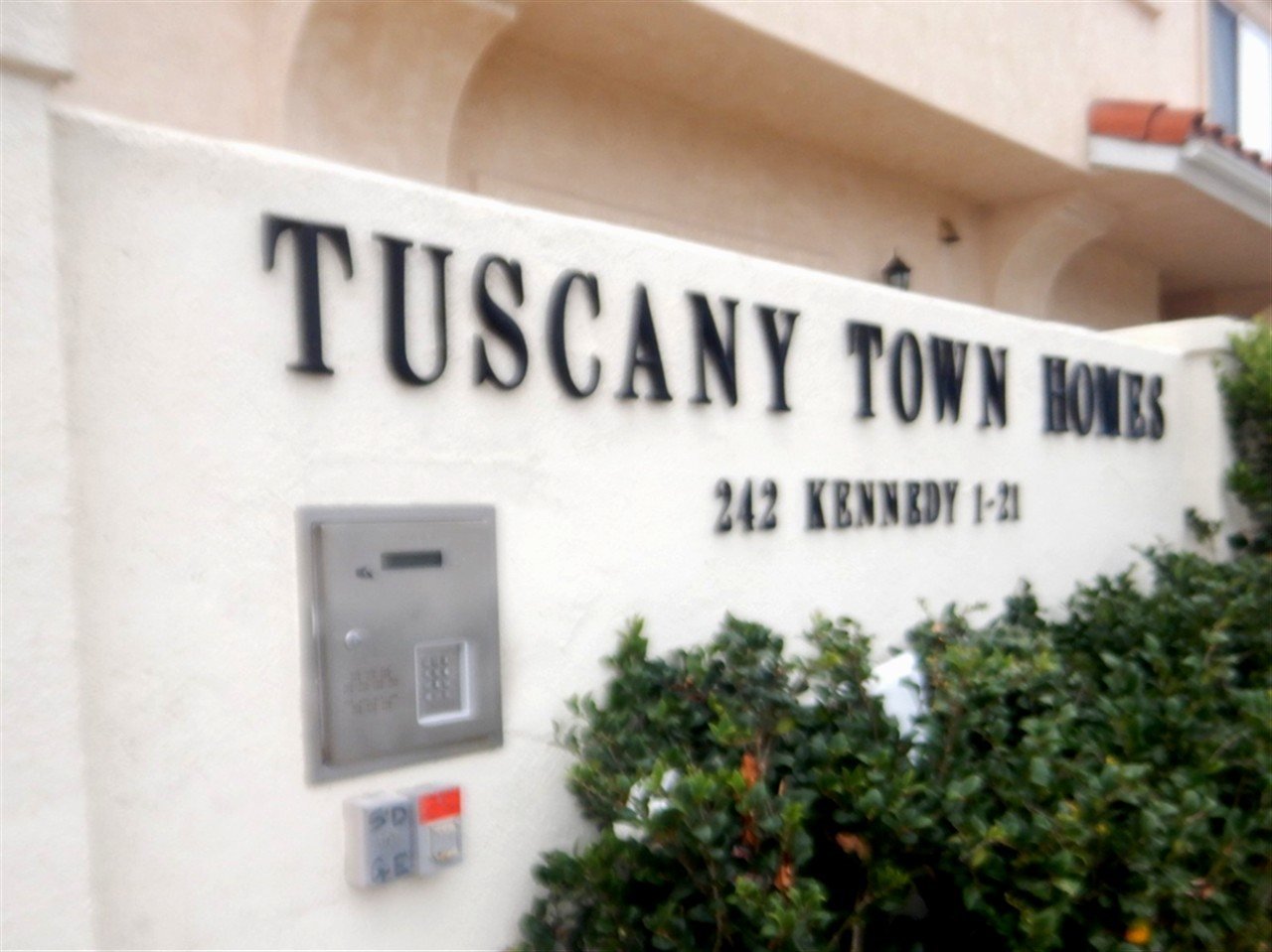 Apartment building at 242 Kennedy St Tuscany Townhomes Chula Vista during a balcony and walkway inspection