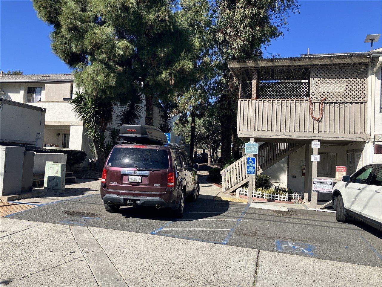 Apartment building at 2675 G St Uptown Villas during a balcony and walkway inspection