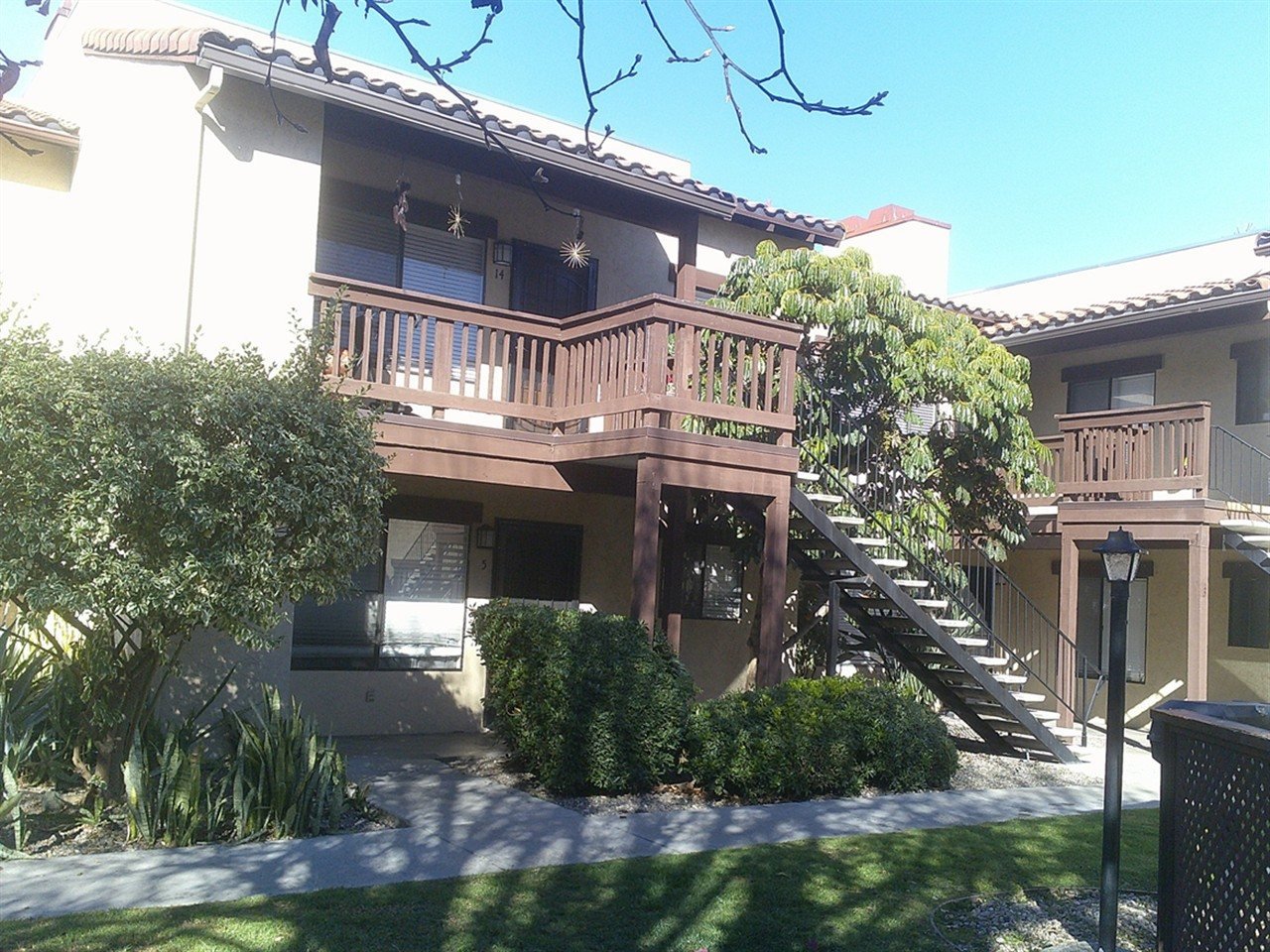 Apartment building at 340 Wells Ave Ballantyne Villas El Cajon during a balcony and walkway inspection
