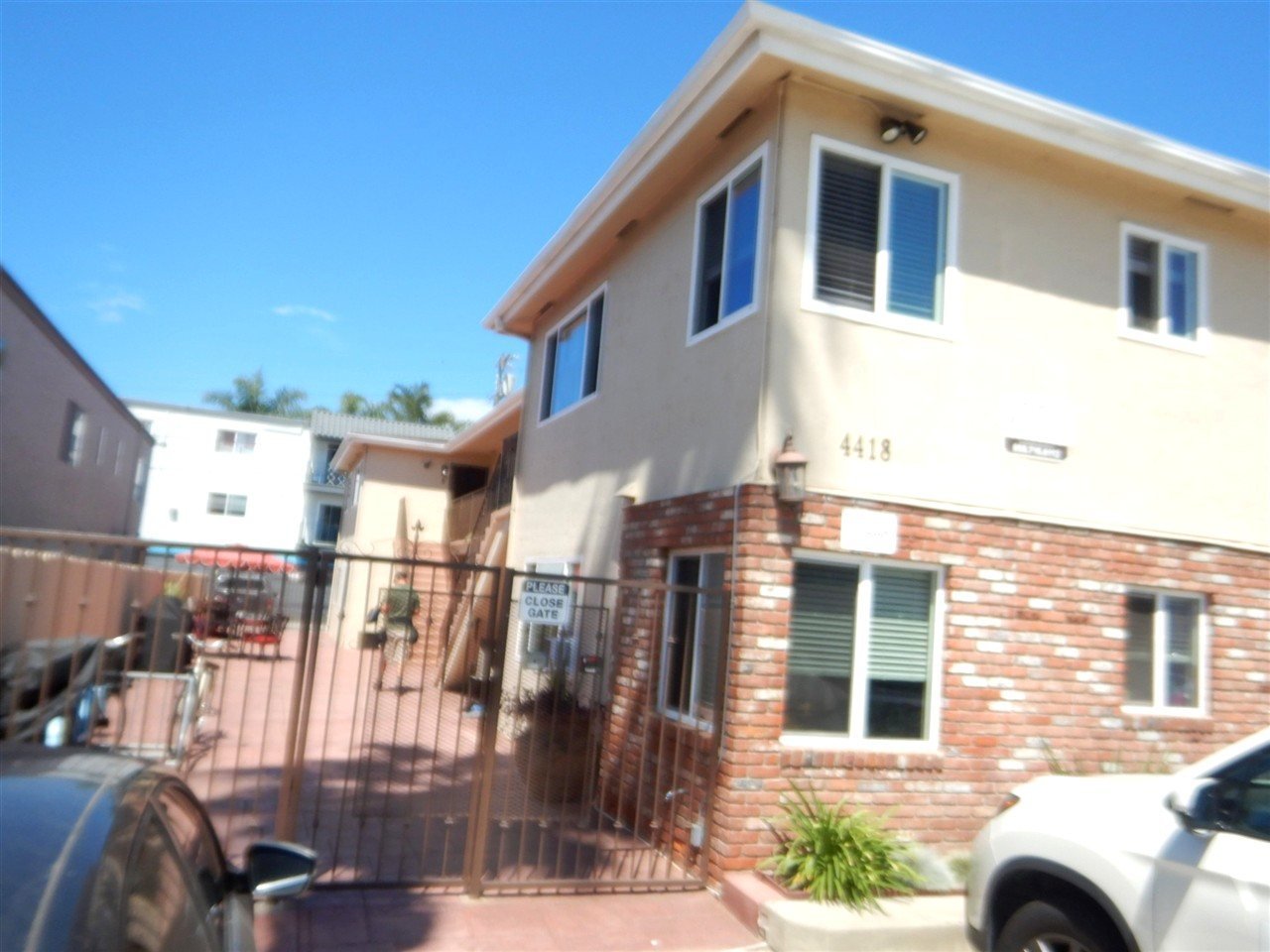 Apartment building at 4418 Bond St San Diego during a balcony and walkway inspection