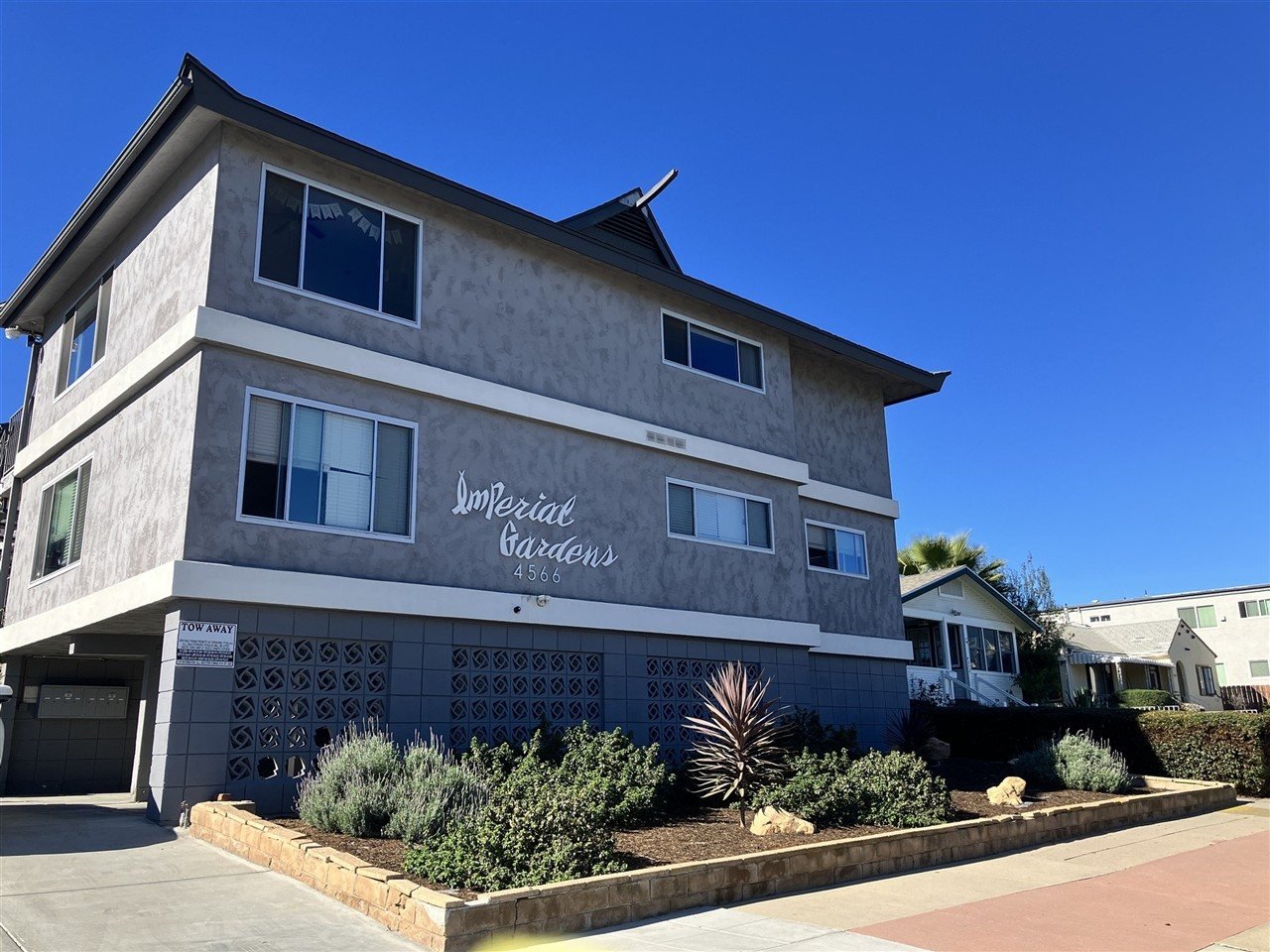 Apartment building at 4566 Date Ave Imperial Gardens during a balcony and walkway inspection