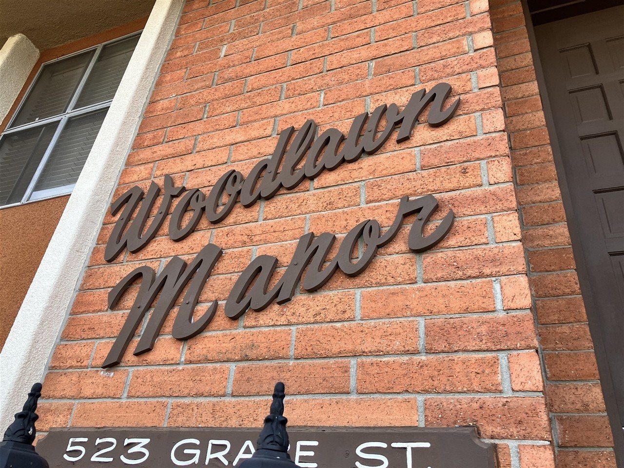 Apartment building at 523 Grape St Woodlawn Manor during a balcony and walkway inspection