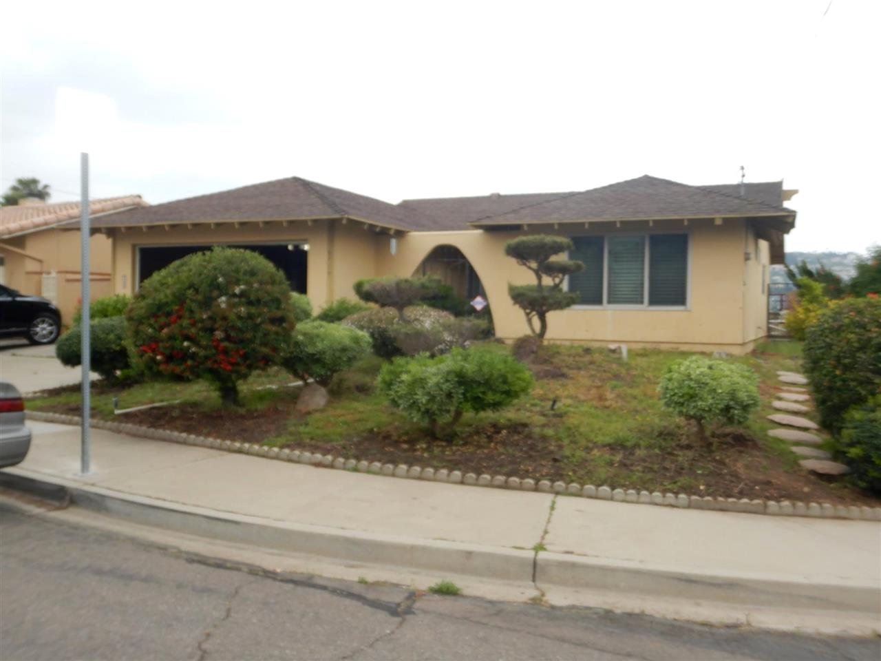 Apartment building at 5719 Lone Star Dr San Diego during a balcony and walkway inspection