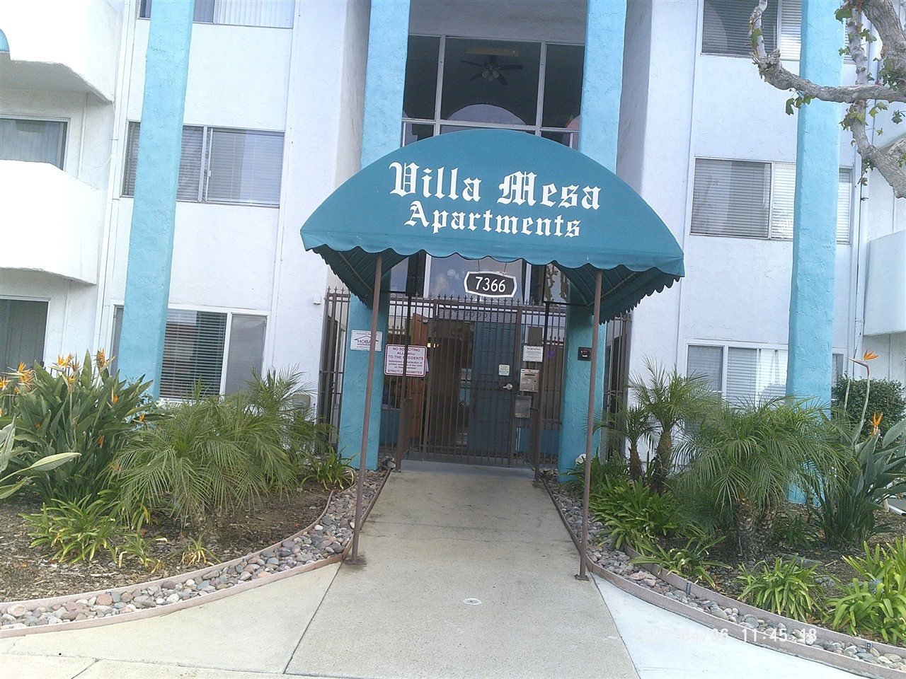 Apartment building at 7366 Mesa College Dr Villa Mesa during a balcony and walkway inspection