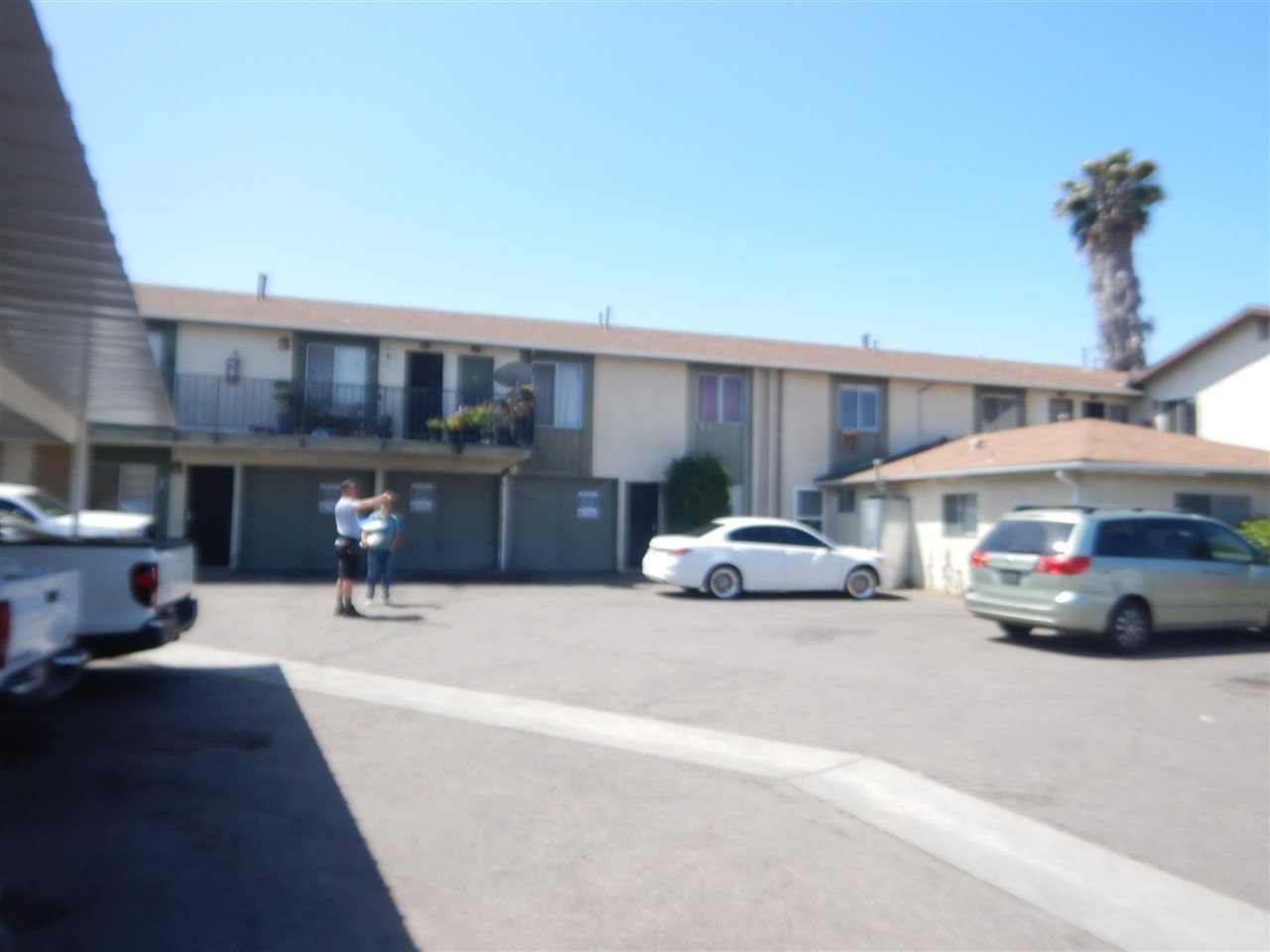 Apartment building at 737 E Washington Ave Escondido during a balcony and walkway inspection