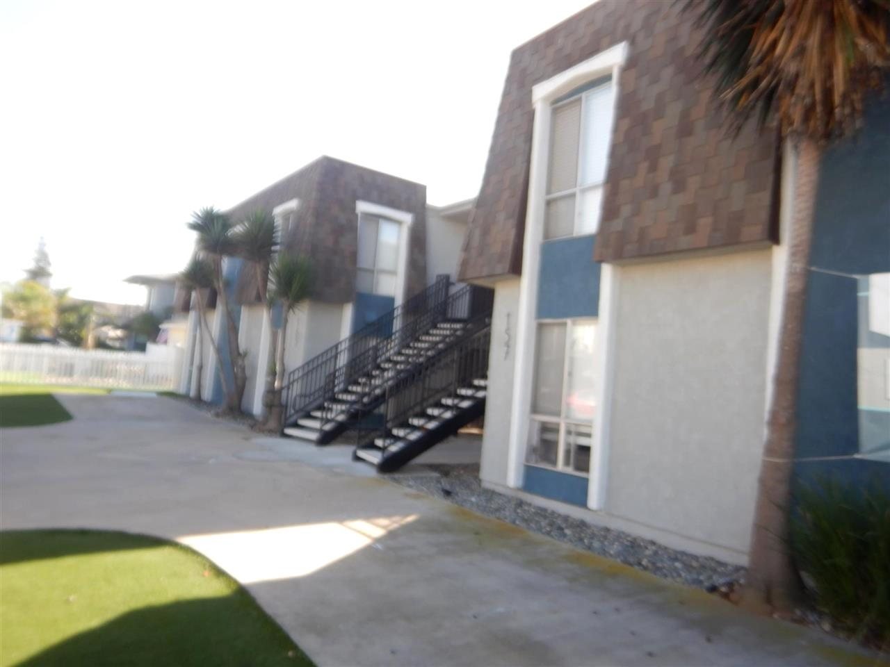 Apartment building at Pier View during a balcony and walkway inspection