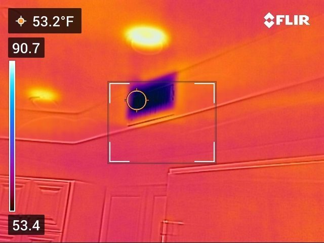 Infrared view of cold supply air flowing from a ceiling register