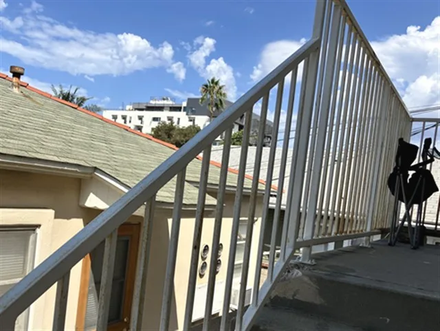 Exterior stairway guardrail inspected during a San Diego SB-326 exterior elevated elements inspection.